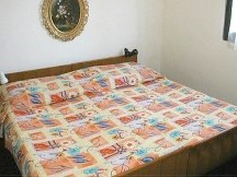 camera da letto casa 100